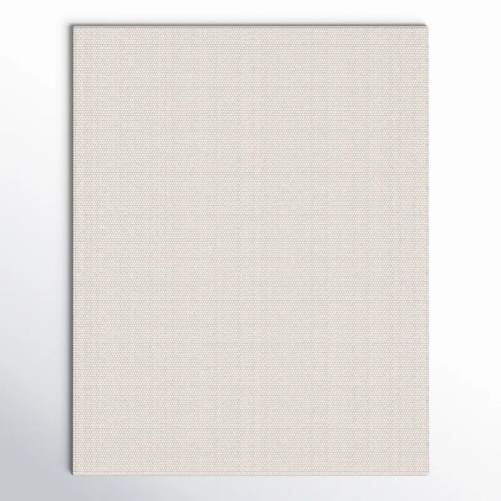 Charvik Solid Colour Handmade Area Rug in Ivory